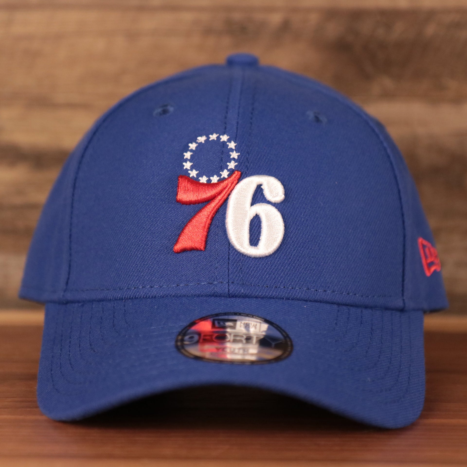 front of the Philadelphia 76ers Blue Adjustable Youth Dad Hat