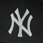 yankees logo on the New York Yankees Mesh Back Trucker Hat | Navy Mesh Dad Hat