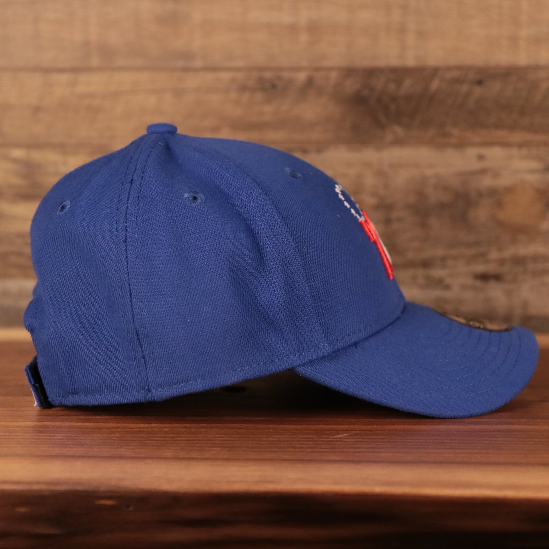 wearers right side of the Philadelphia 76ers Blue Adjustable Youth Dad Hat