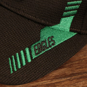 Racing stripes with Eagles lettering on the Philadelphia Eagles 2021 Sideline On-Field Throwback Logo 39Thirty Stretch Cap
