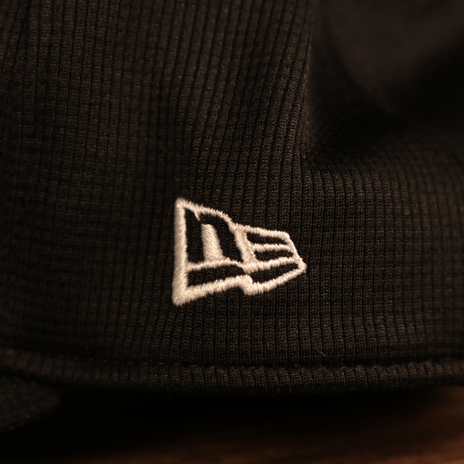 Close up of the New Era logo for the Philadelphia Eagles 2021 Sideline On-Field Throwback Logo 39Thirty Stretch Cap
