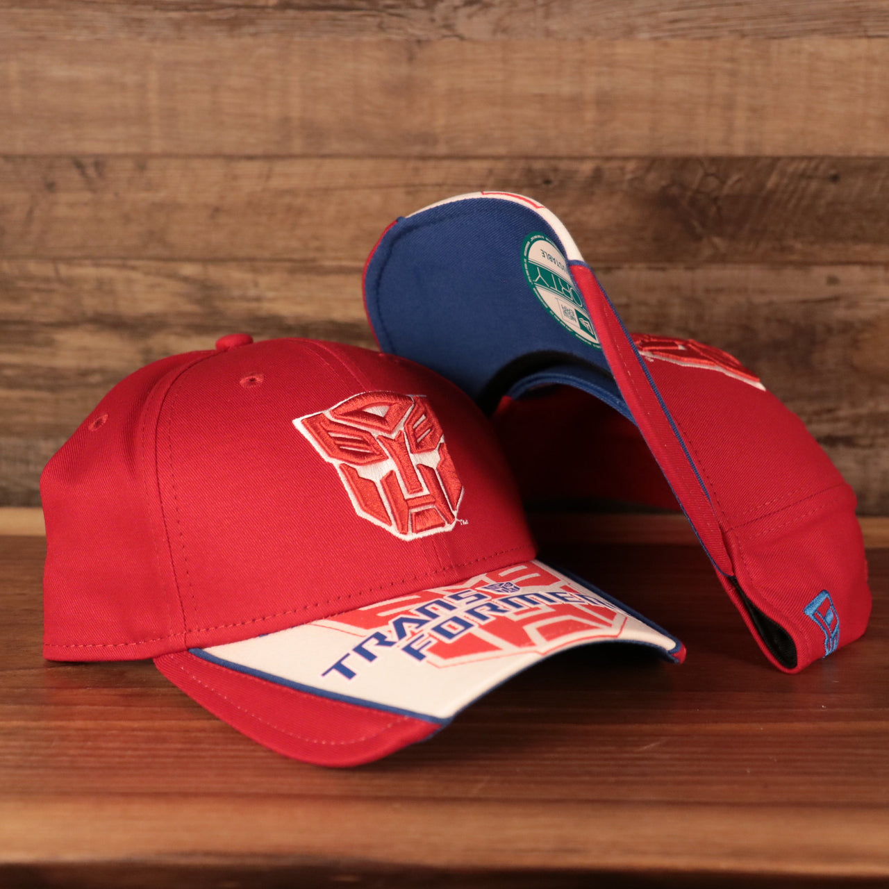 front and bottom of the Transformers Auto Bots Red and White 9Twenty Adjustable Dad Hat