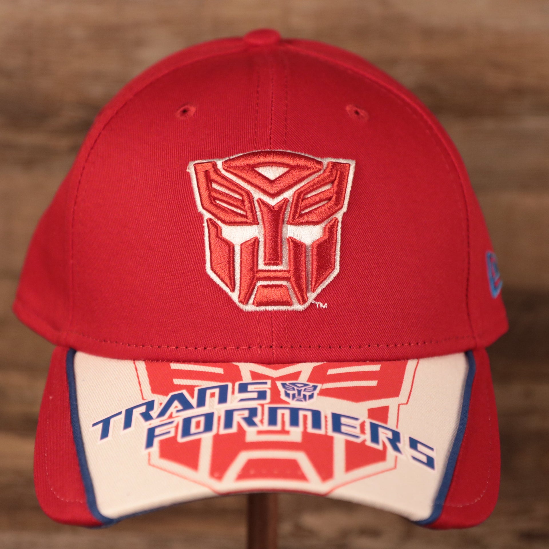 front of the Transformers Auto Bots Red and White 9Twenty Adjustable Dad Hat