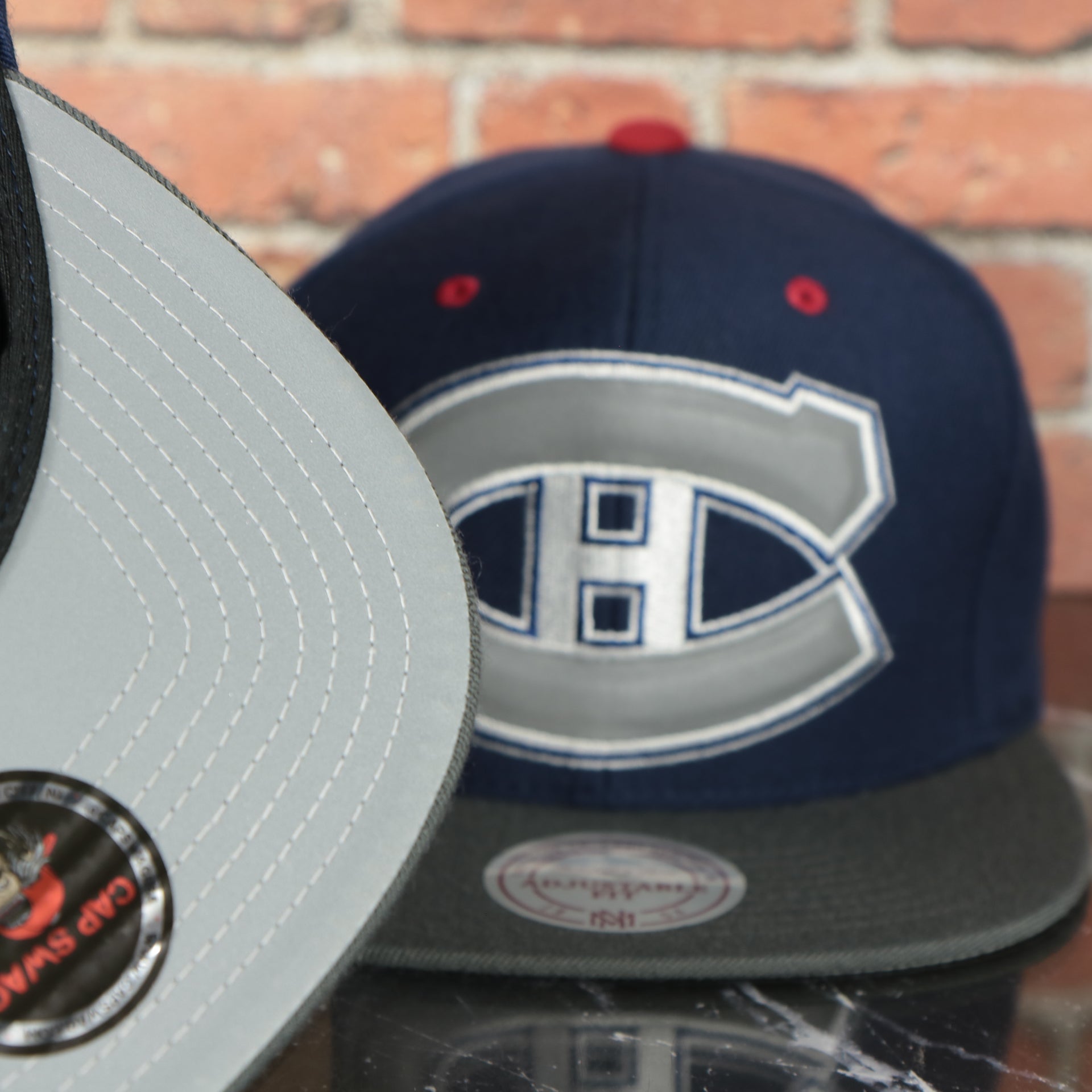grey under visor on the Montreal Canadiens Navy Blue on Gray Reflective Snapback Hat