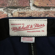 mitchell and ness label on the Montreal Canadiens Navy Blue on Gray Reflective Snapback Hat