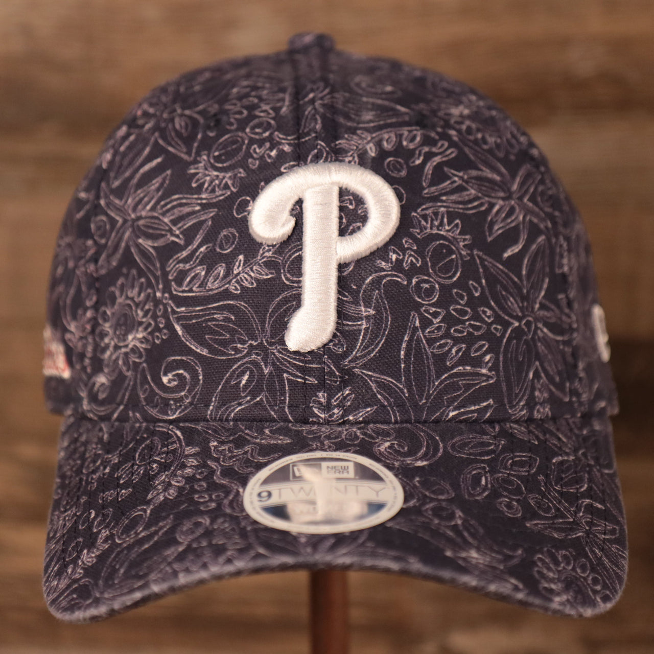 front of the Philadelphia Phillies Floral Pattern Blue Women's 9Twenty Adjustable Dad Hat