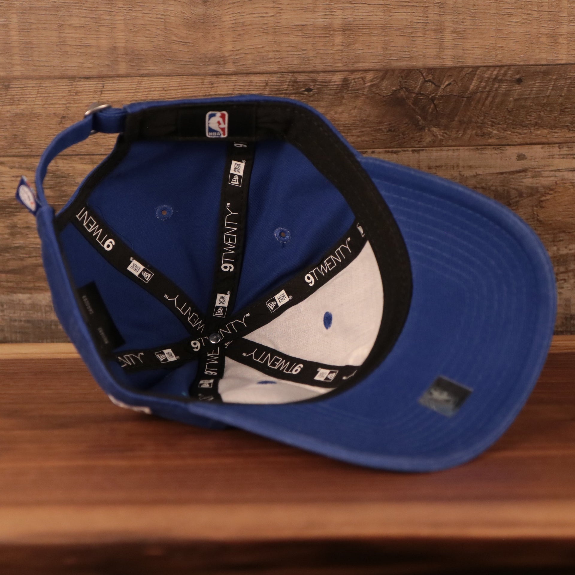 underside of the Philadelphia 76ers Blue Adjustable Women's Dad Hat
