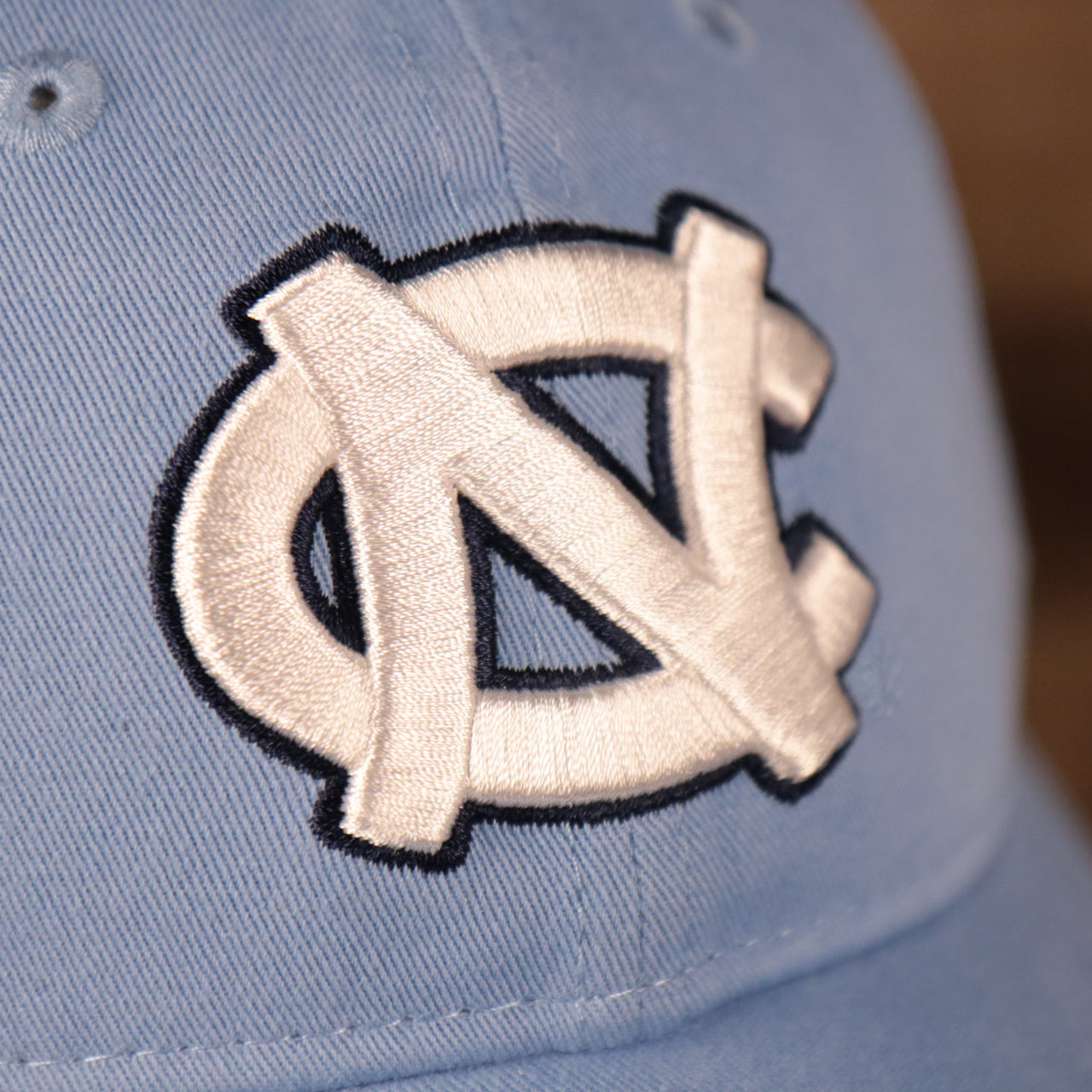 logo shot on the North Carolina Tar Heels Carolina Blue 9Twenty Adjustable Dad Hat