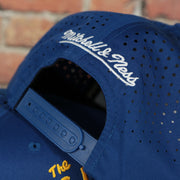 blue adjustable snap on the Golden State Warriors Mitchell and Ness Perforated Snapback Hat