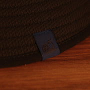orange tag on the brim of New York Yankees Spring Training 2022 On Field Navy Bucket Hat
