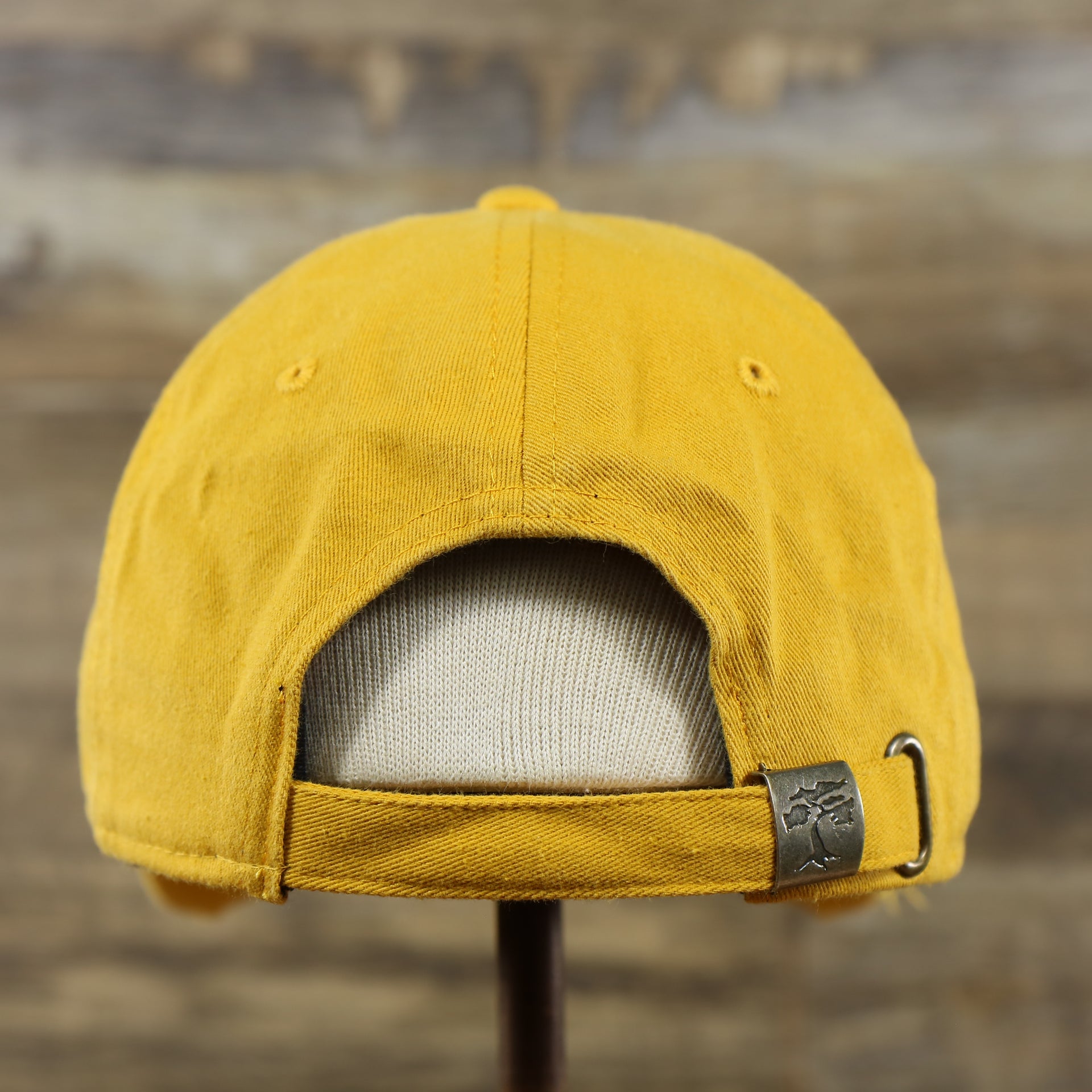 The backside of the Mustard Yellow Flat Brim Distressed Blank Baseball Hat | Yellow Dad Hat