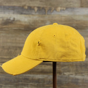 The wearer's left of the Mustard Yellow Flat Brim Distressed Blank Baseball Hat | Yellow Dad Hat