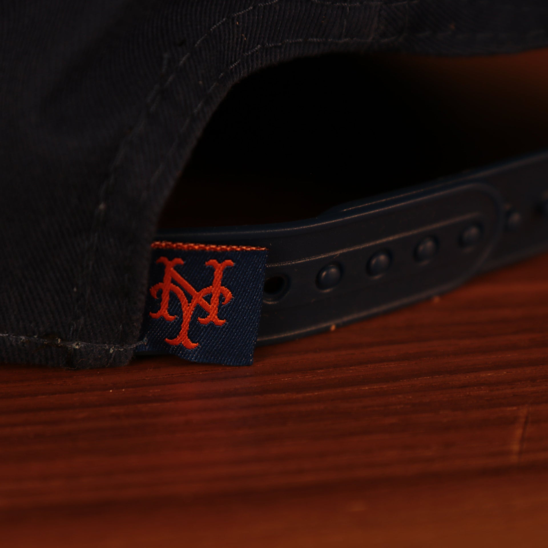 mets logo tag on the New York Mets Spring Training 2022 Mr. Met Retro On Field Blue Youth 9Forty Dad Hat
