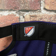 MLS label on the Orlando City Lions XL Logo Two Tone Purple on Black Snapback Hat
