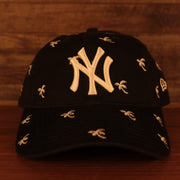 front of the New York Yankees Spring Training 2022 Youth All Over Palm Tree Navy 9Twenty Dad Hat