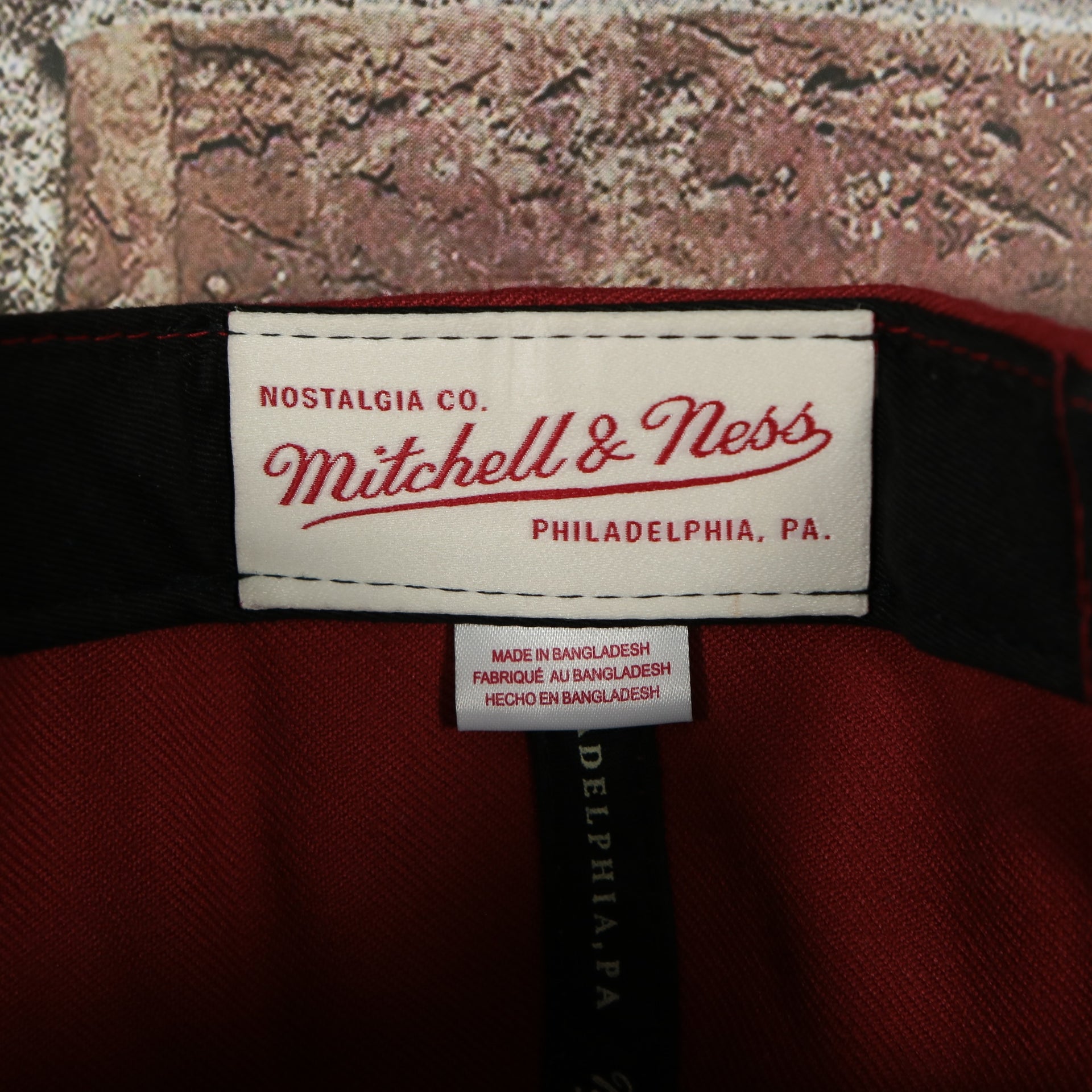 mtichell and ness label on the Miami Heat Two Tone Reflective Snapback Hat