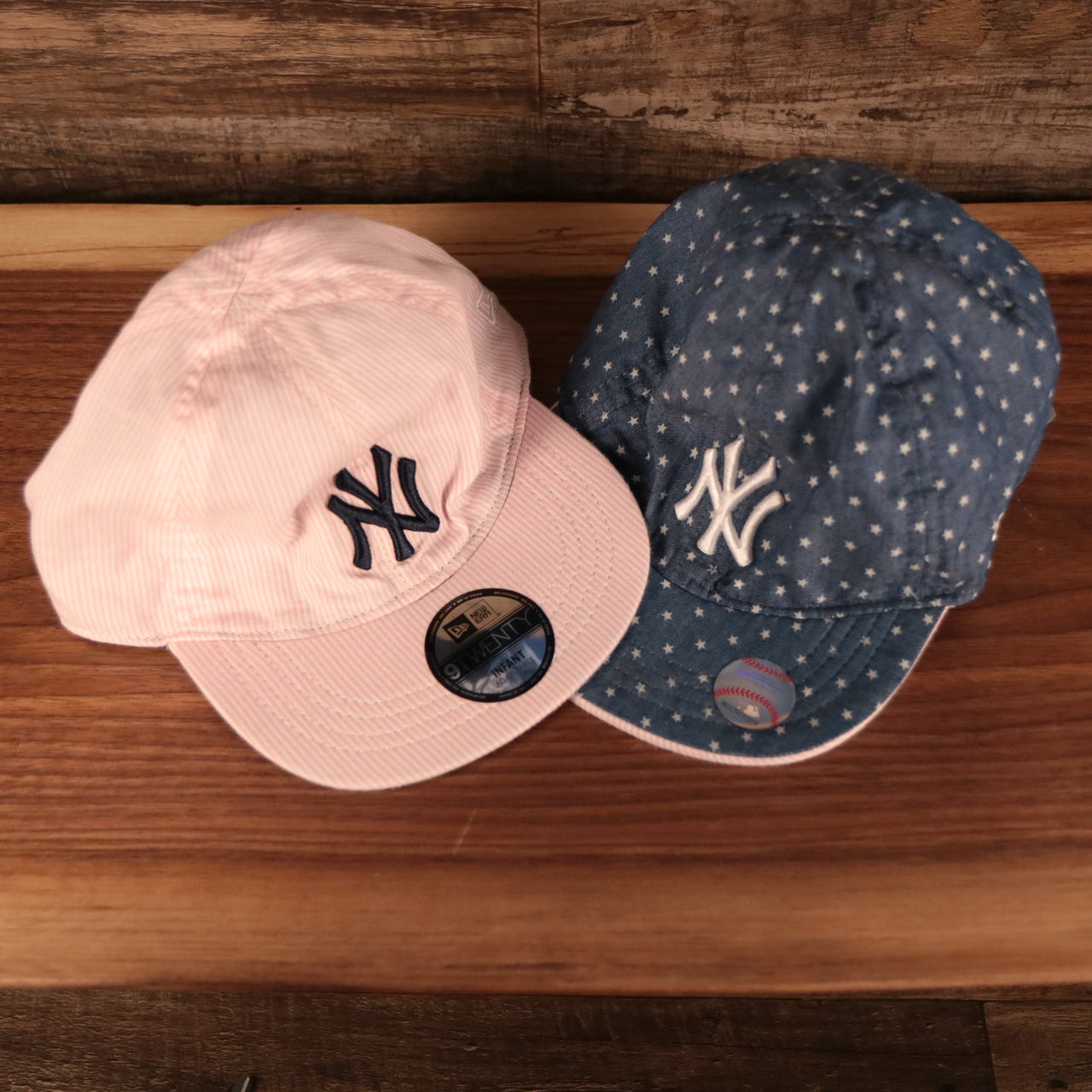 top view of both sides New York Yankees Reversible Navy & Pink Infant 9Twenty Dad Hat