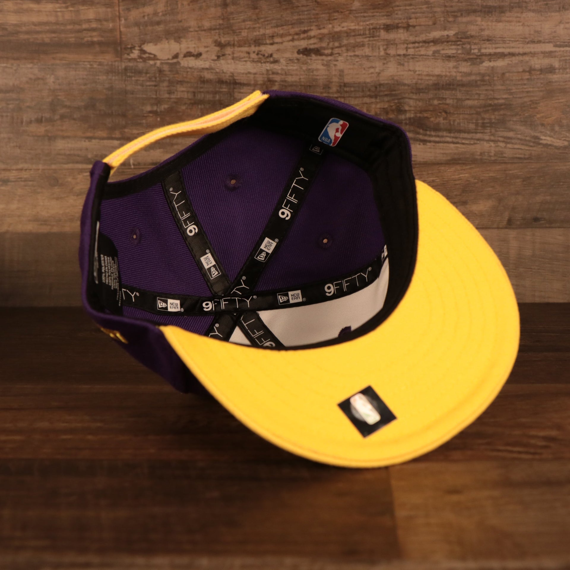 Yellow under visor of the Los Angeles Lakers My 1st 9Fifty Baby Snapback Hat | Purple/Yellow