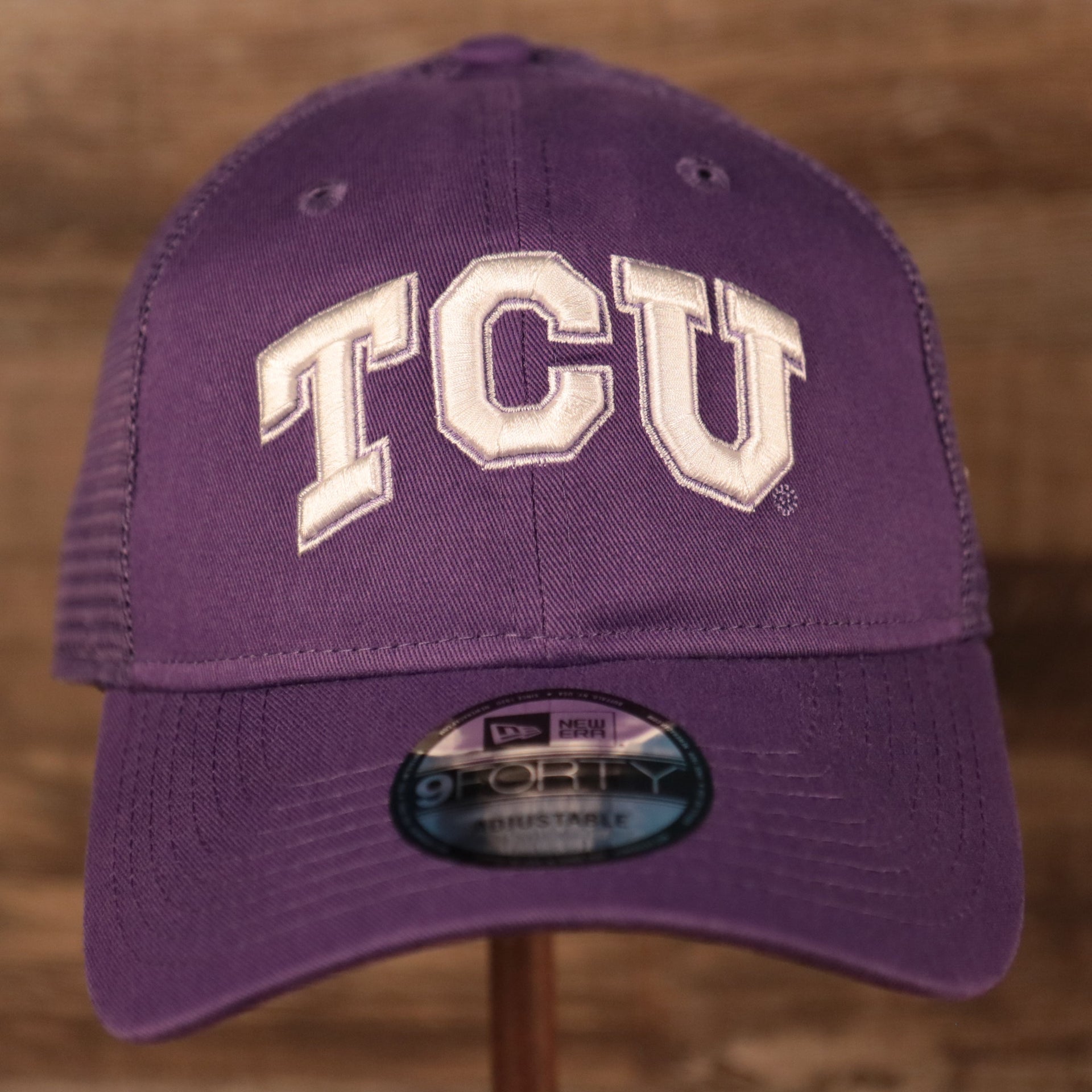 front of the TCU Horned Frogs Purple Adjustable Trucker Dad Hat