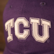 tcu logo on the front of the TCU Horned Frogs Purple Adjustable Trucker Dad Hat