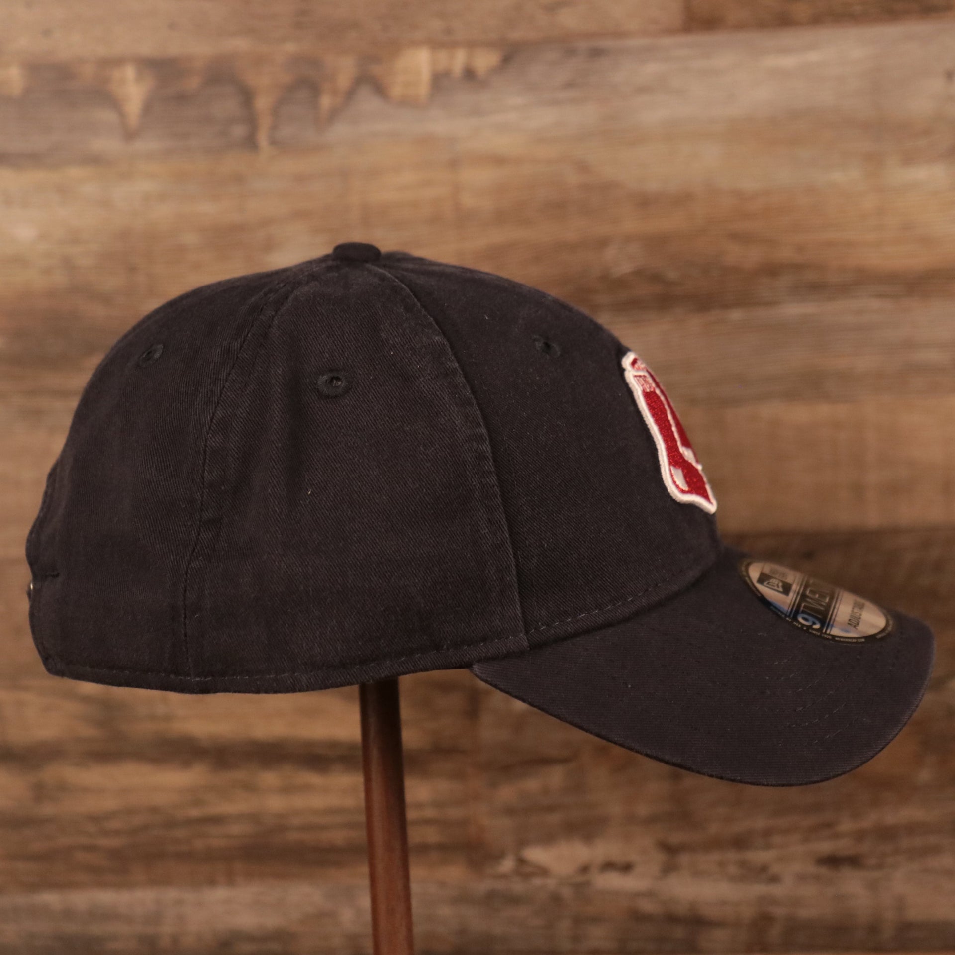 wearers left side of the Boston Red Sox Navy Blue 9Twenty Adjustable Dad Hat