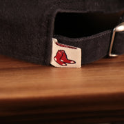 red sox logo tag on the Boston Red Sox Navy Blue 9Twenty Adjustable Dad Hat