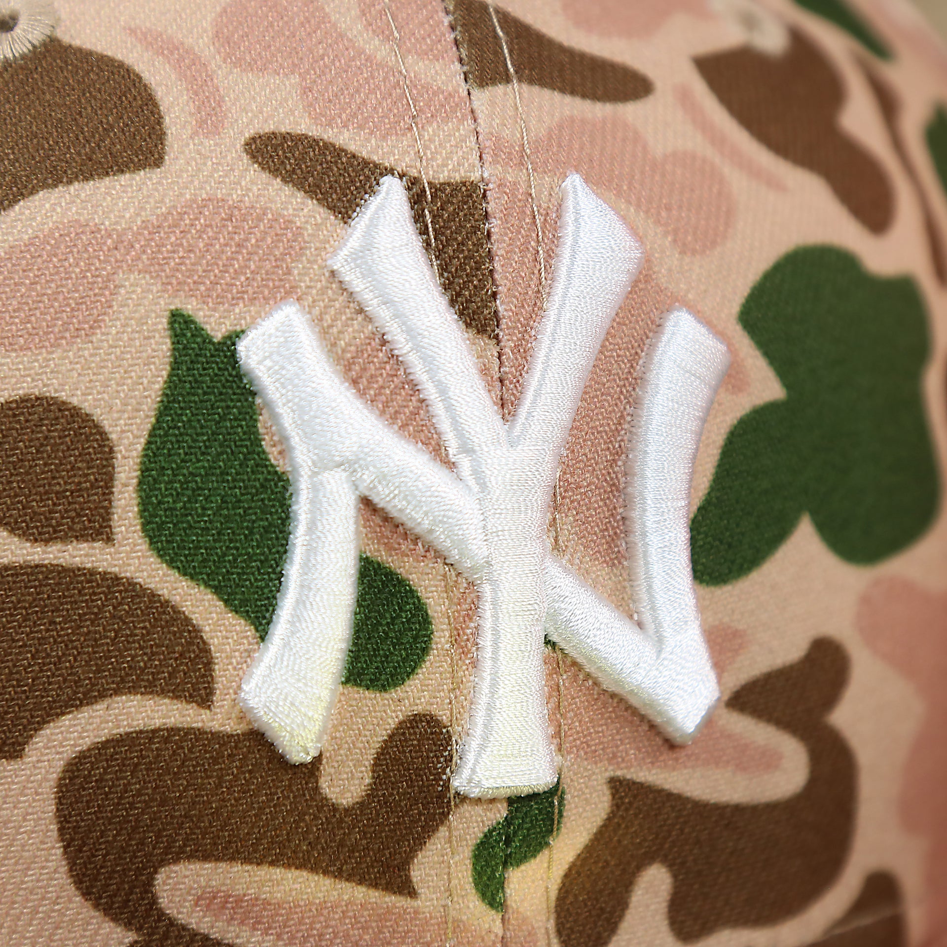 The Yankees Logo on the New York Yankees Duck Camo Neon Orange Undervisor World Series Side Patch Fitted Cap | Camo Tan 59Fifty Cap