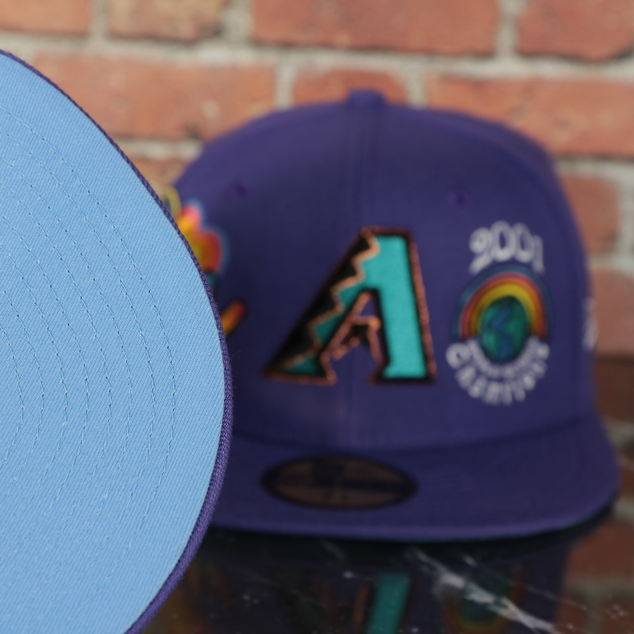 sky blue under visor on the Arizona Diamondbacks Cooperstown Groovy World Series Champions Patch 59Fifty Fitted Cap | New Era Groovy Side Patch 5950