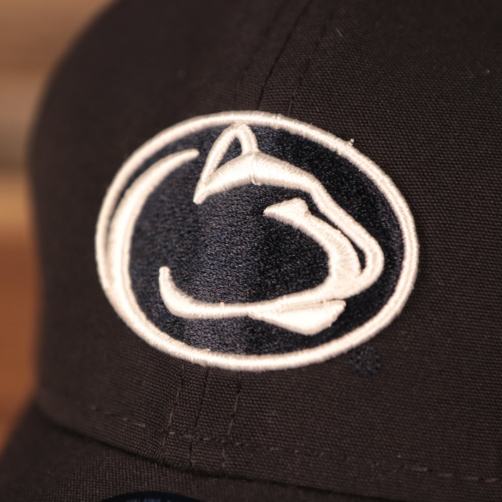 penn state logo on the Penn State Nittany Lions Navy Nittany Lion logo Stretch Back Infant Dad Hat