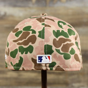 The backside of the New York Yankees Duck Camo Neon Orange Undervisor World Series Side Patch Fitted Cap | Camo Tan 59Fifty Cap
