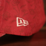 new era logo on the Philadelphia Phillies Floral Pattern Red Child 9Twenty Adjustable Dad Hat