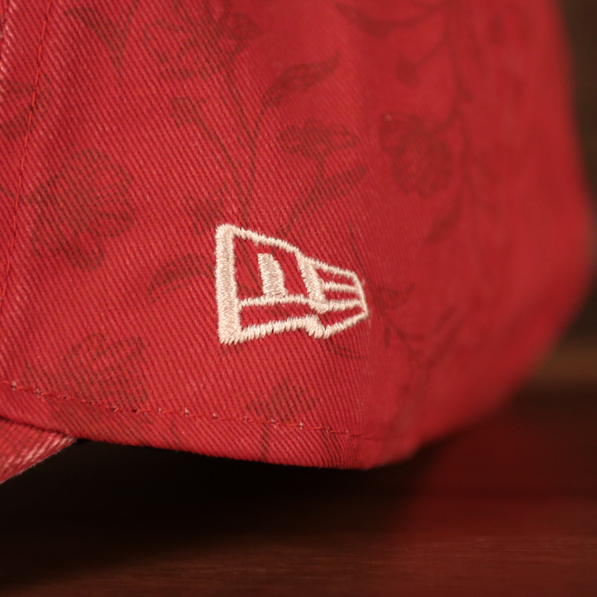 new era logo on the Philadelphia Phillies Floral Pattern Red Toddler 9Twenty Adjustable Dad Hat
