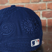 mlb logo on the Los Angeles Dodgers Paisley Bandana Print Embroidered 59Fifty Fitted Cap | New Era MLB Swirl 5950
