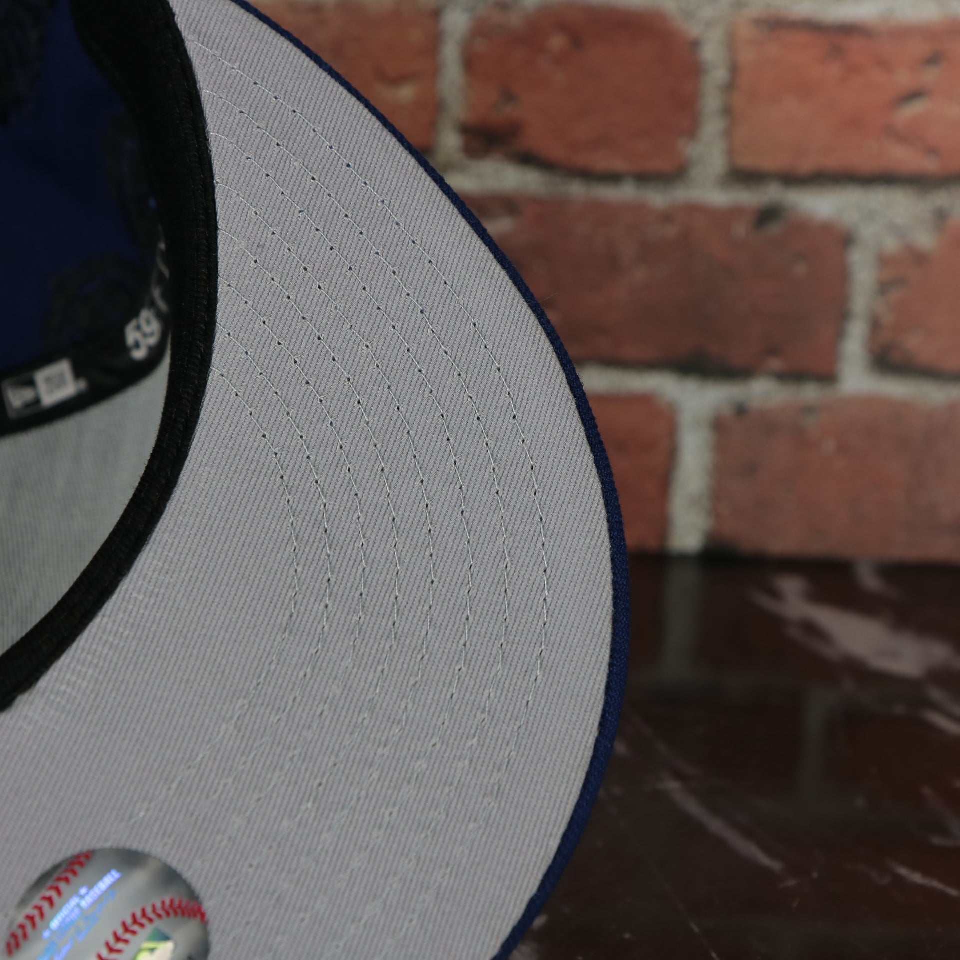 grey under visor on the Los Angeles Dodgers Paisley Bandana Print Embroidered 59Fifty Fitted Cap | New Era MLB Swirl 5950