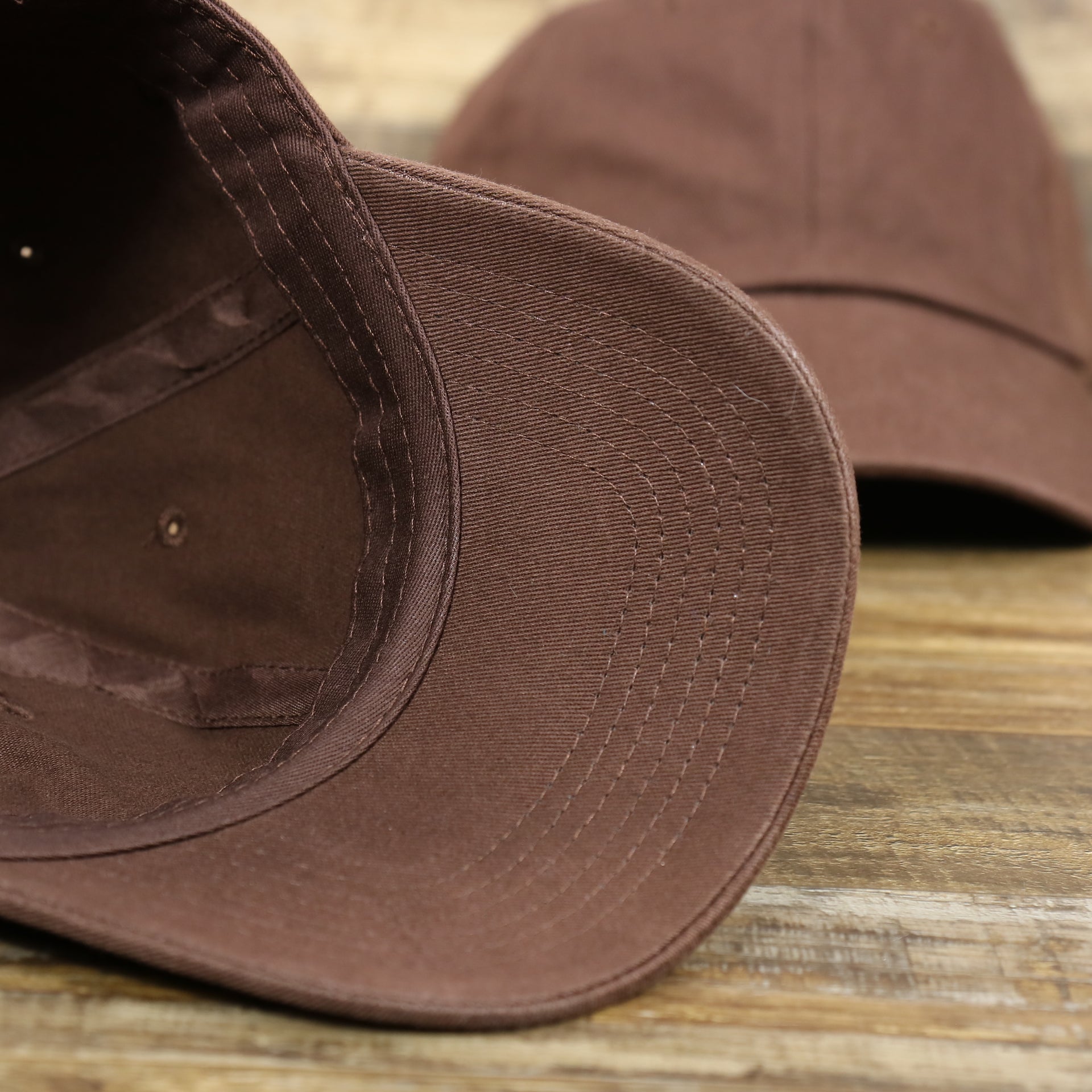 The undervisor on the Chocolate Bent Brim Blank Baseball Hat | Brown Dad Hat