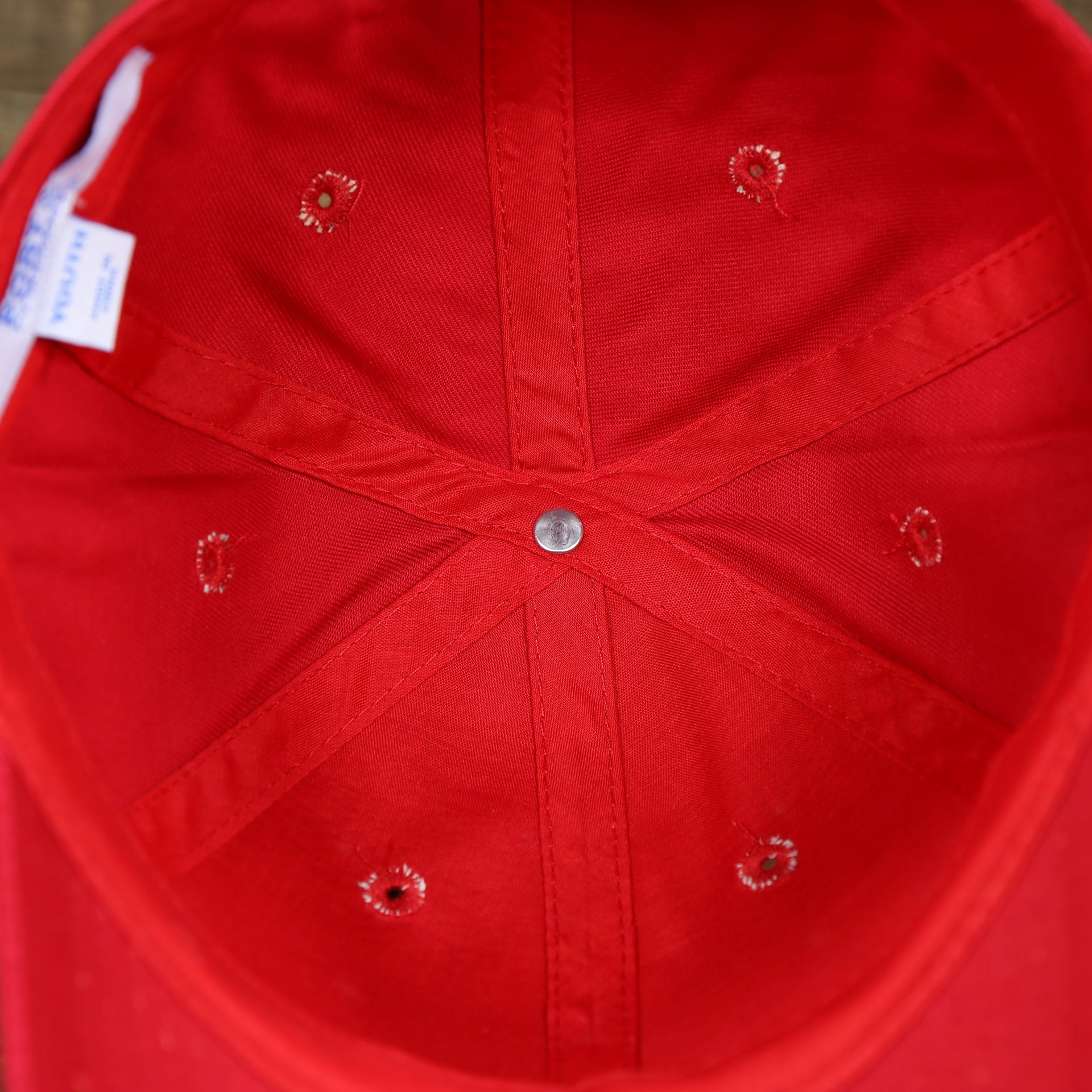 The inside of the Youth Cardinal Red Flat Brim Blank Baseball Hat | Kid’s Red Dad Hat