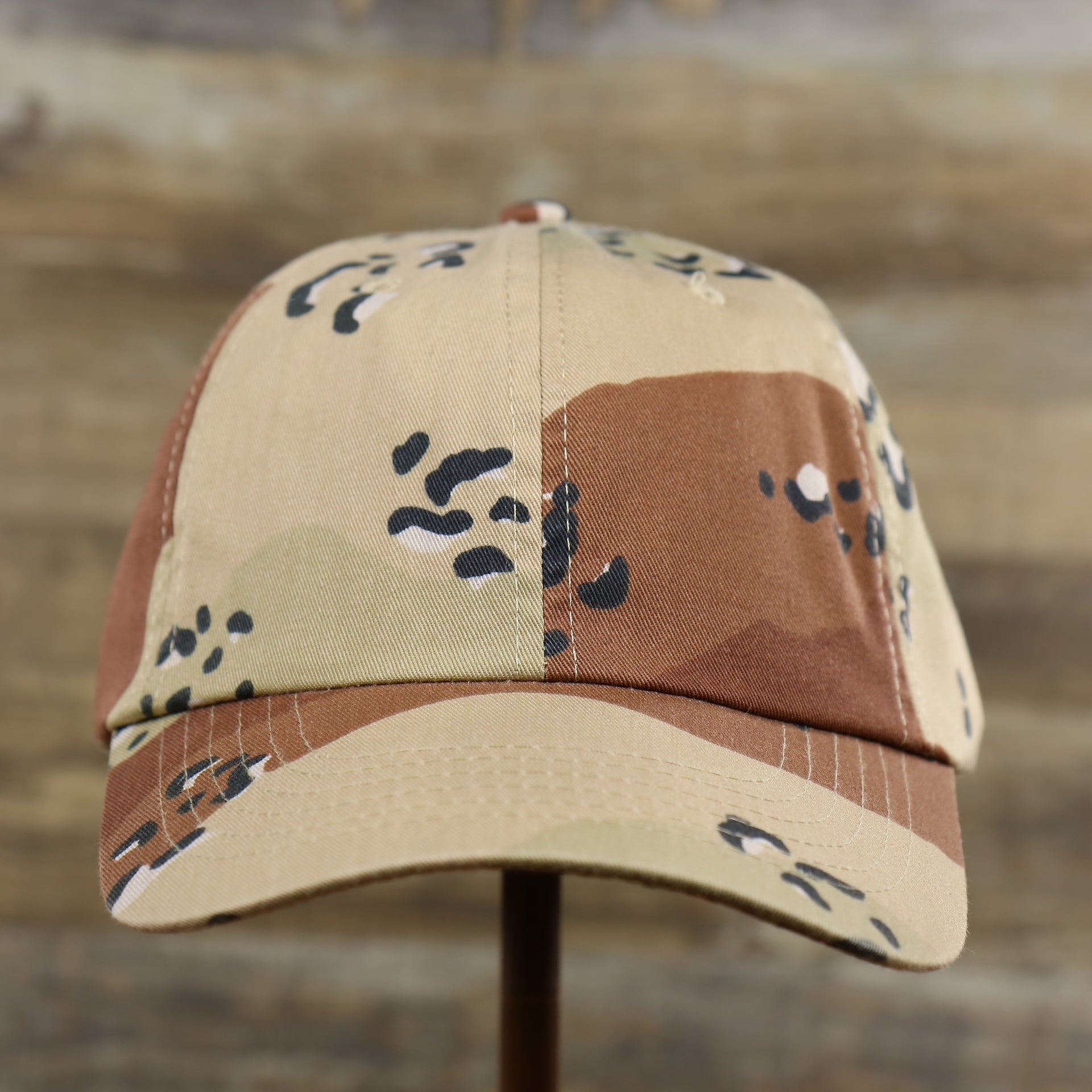 The front of the Desert Camo Bent Brim Blank Baseball Hat | Tan Dad Hat