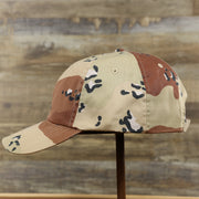 The wearer's left of the Desert Camo Bent Brim Blank Baseball Hat | Tan Dad Hat