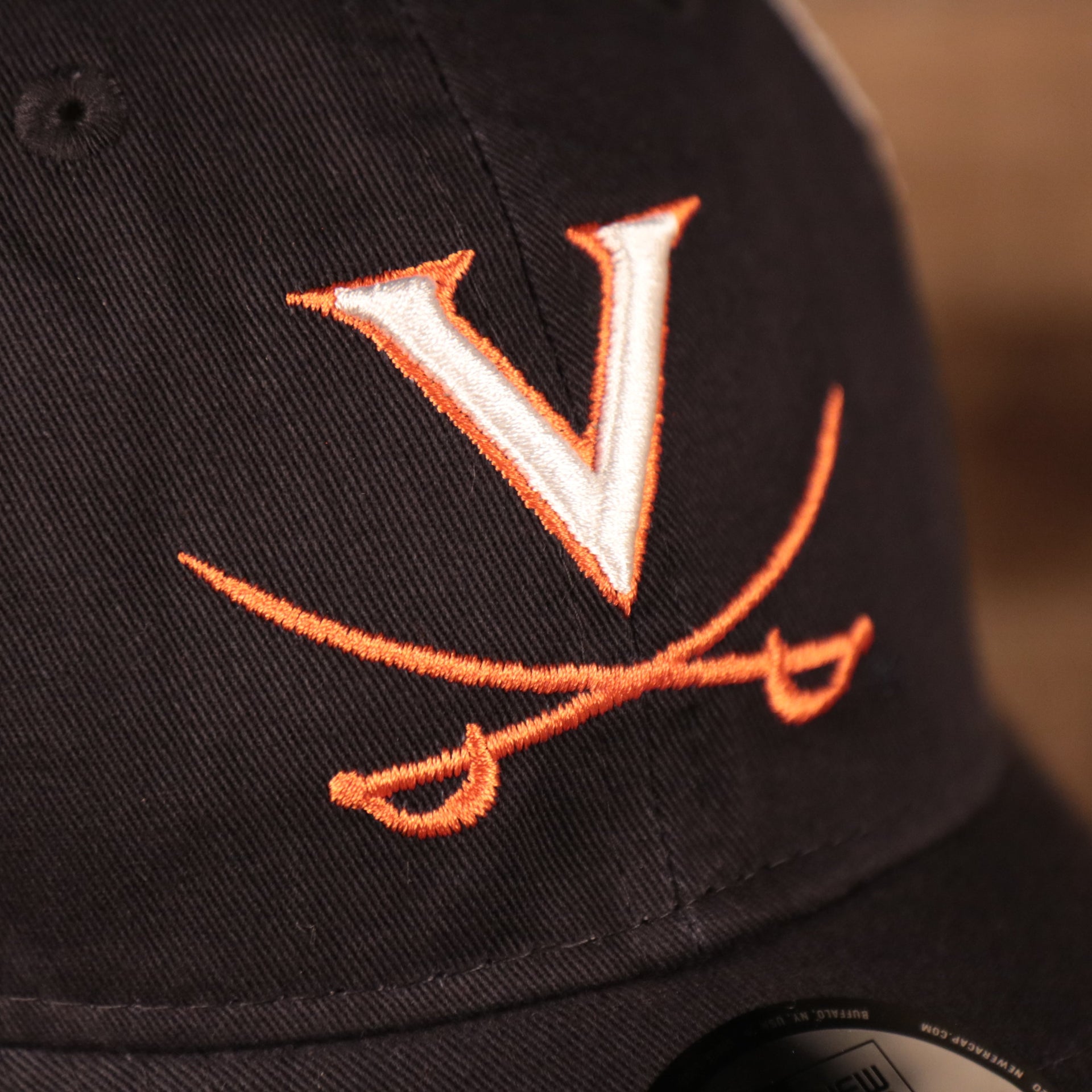 virginia logo Virginia Cavaliers Navy Adjustable Orange Bottom Distressed Trucker Cap