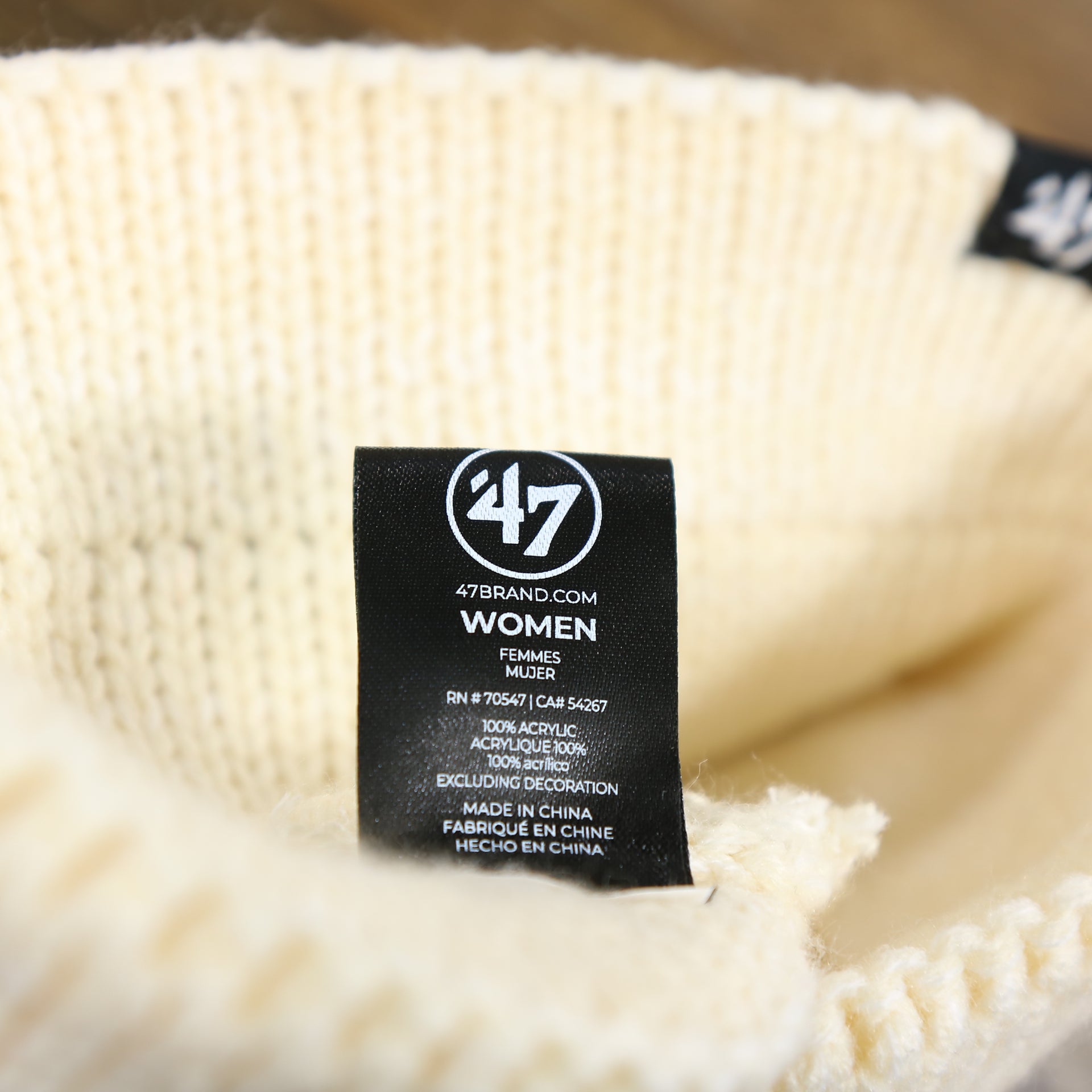 The 47 Brand Tag on the Women’s Philadelphia Eagles Winter Knit Cream Twisted Headband | White Twisted Headband