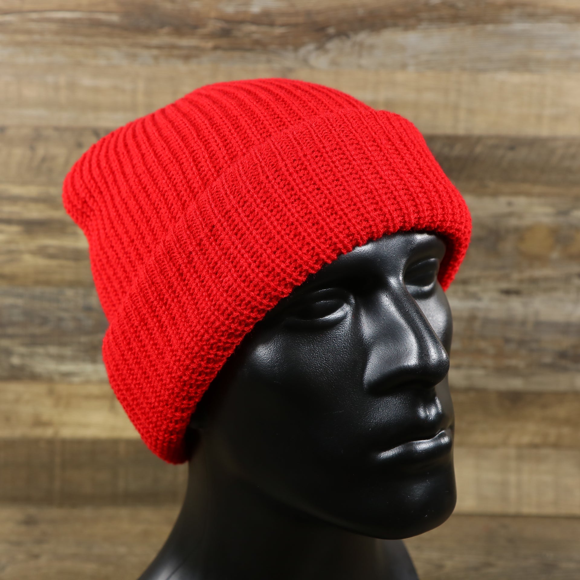 The Cardinal Red Blank Three Hole Winter Knit Ski Mask | Red Ski Mask rolled up as a beanie with a mannequin 