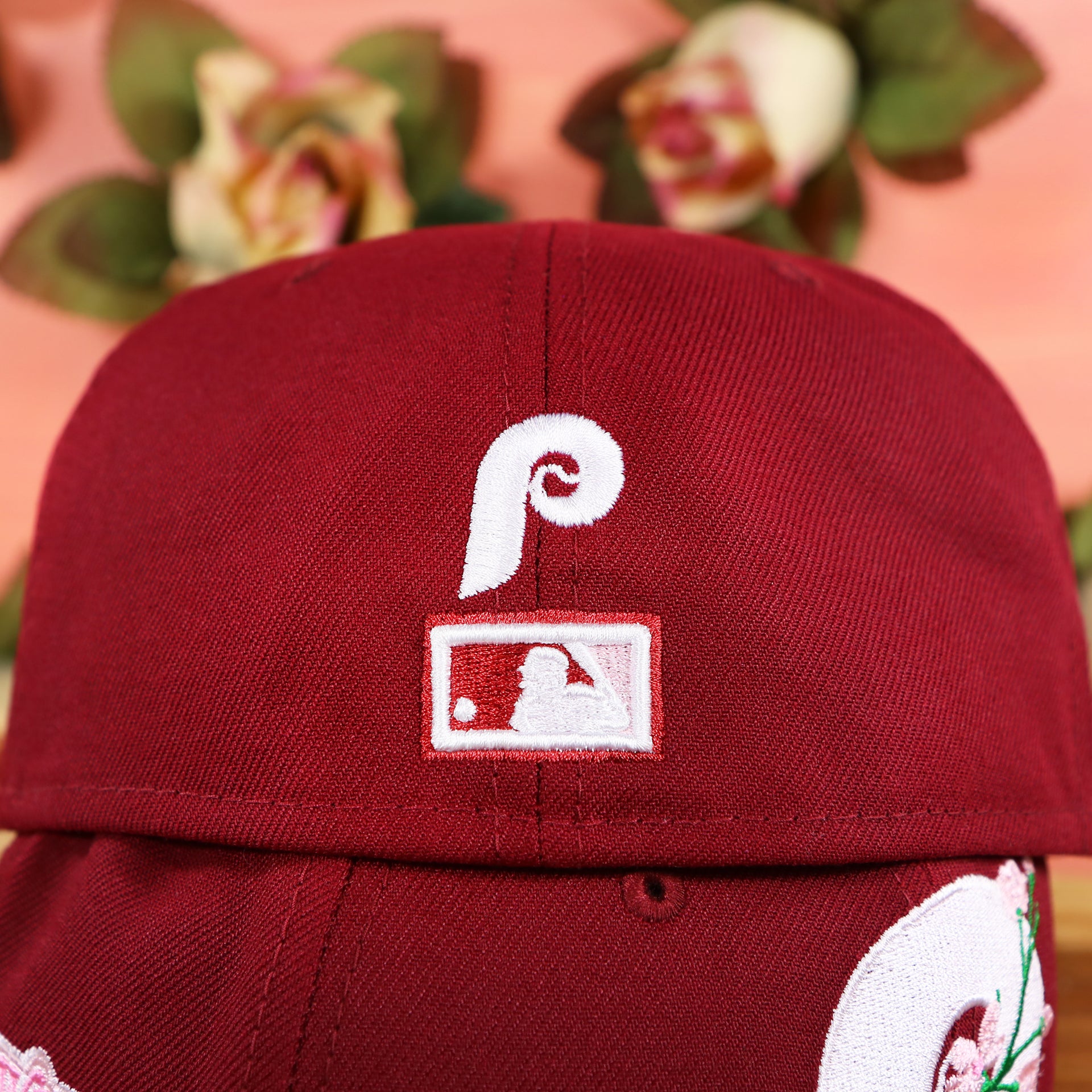 The Cooperstown Mini Phillies Logo and Retro MLB Batterman logo on the Cooperstown Philadelphia Philadelphia Pink Undervisor Sakura Tree Embroidered 59Fifty Fitted Cap | Maroon 59Fifty Cap