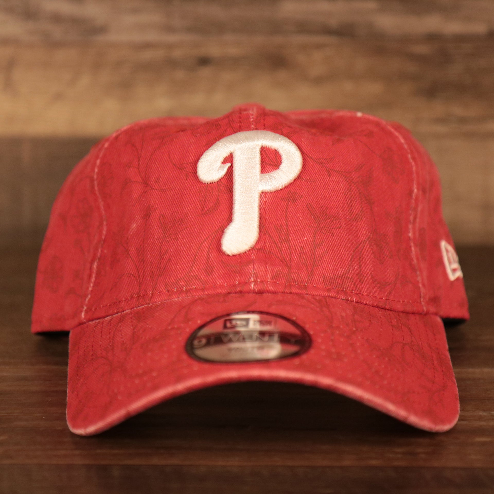 front of the Philadelphia Phillies Floral Patter Red Youth 9Twenty Dad Hat