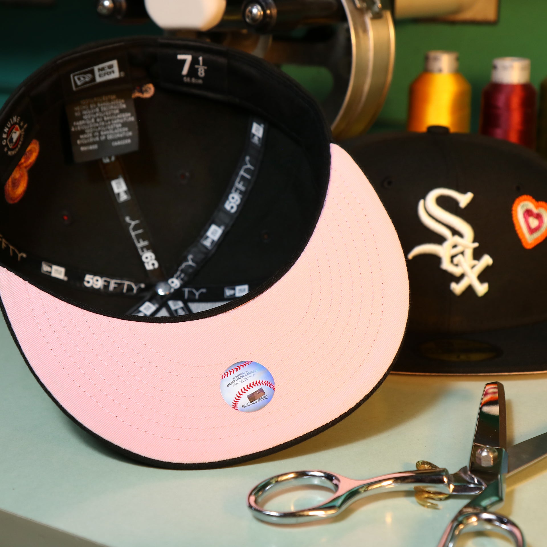 The Pink Undervisor on the Chicago White Sox All Over Embroidered Chain Stitch Heart Pink Bottom 59Fifty Fitted Cap | Black 59Fifty Cap