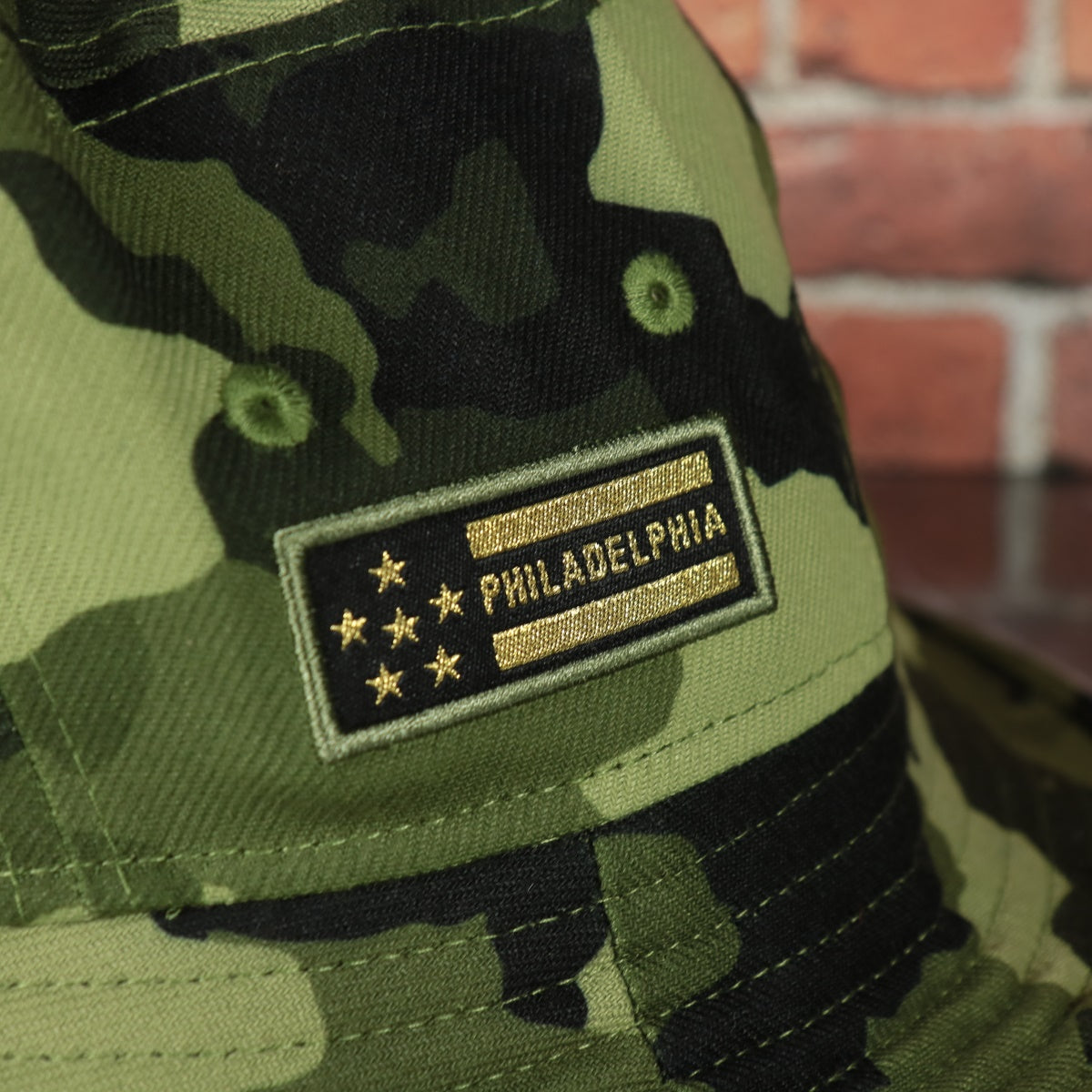 philadelphia patch on the Philadelphia Phillies 2022 Armed Forces Day / Memorial Day Side Patch Boonie Bucket Hat | Camo