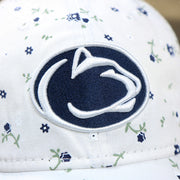 The Nittany Lions Logo on the Women’s Penn State Nittany Lions All Over Micro Floral Print 9Twenty Dad hat | White 9Twenty Hat