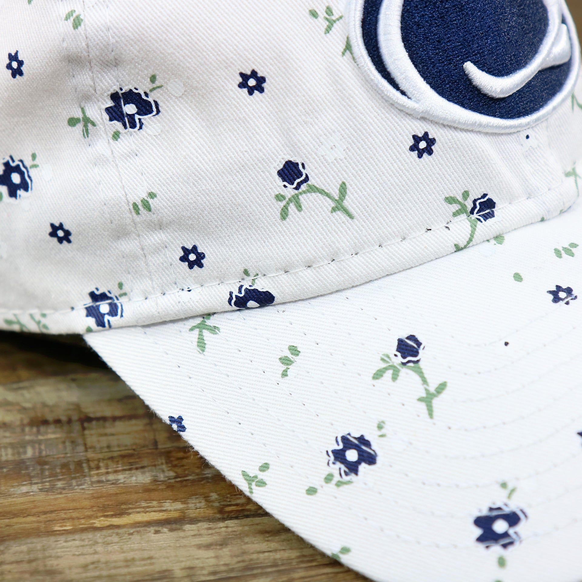 The Micro Floral Print on the Women’s Penn State Nittany Lions All Over Micro Floral Print 9Twenty Dad hat | White 9Twenty Hat