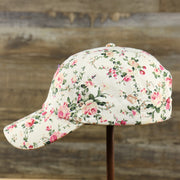 The wearer's left of the Floral Print Blank Adjustable Baseball Hat | Cream Dad Hat