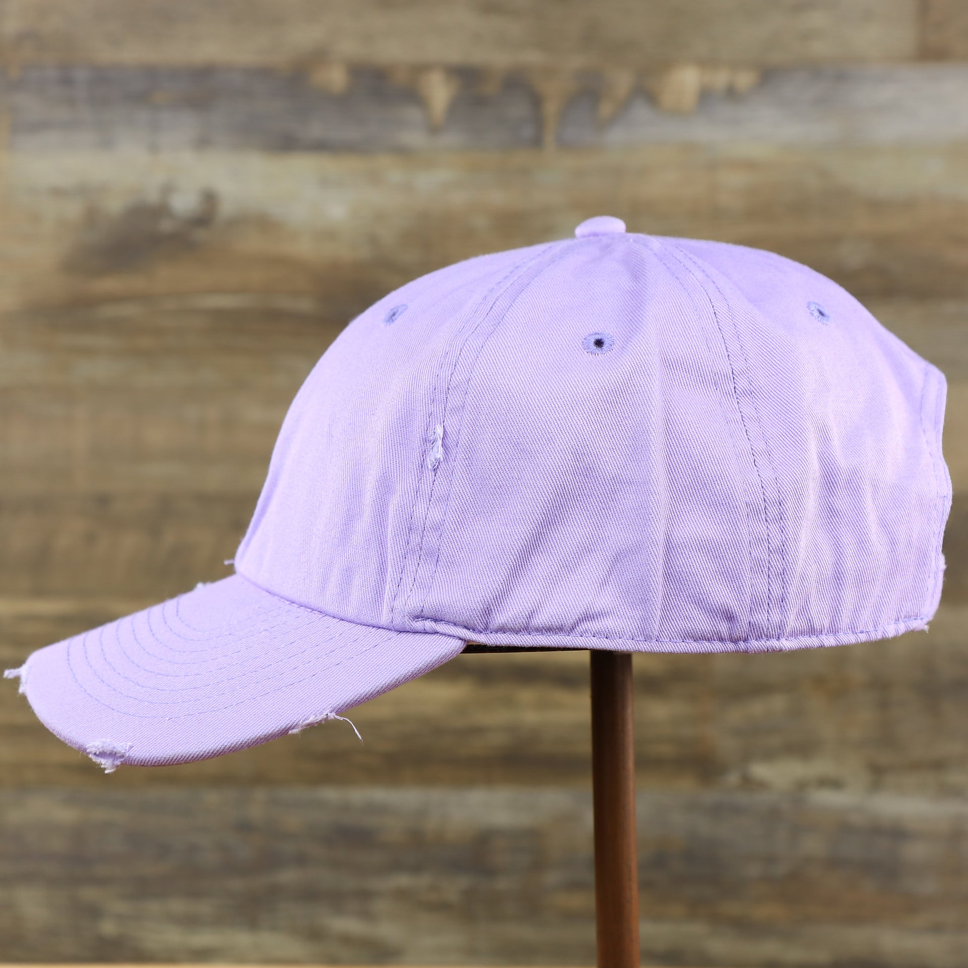 the wearer's left of the Lavender Flat Brim Distressed Blank Baseball Hat | Light Purple Dad Hat