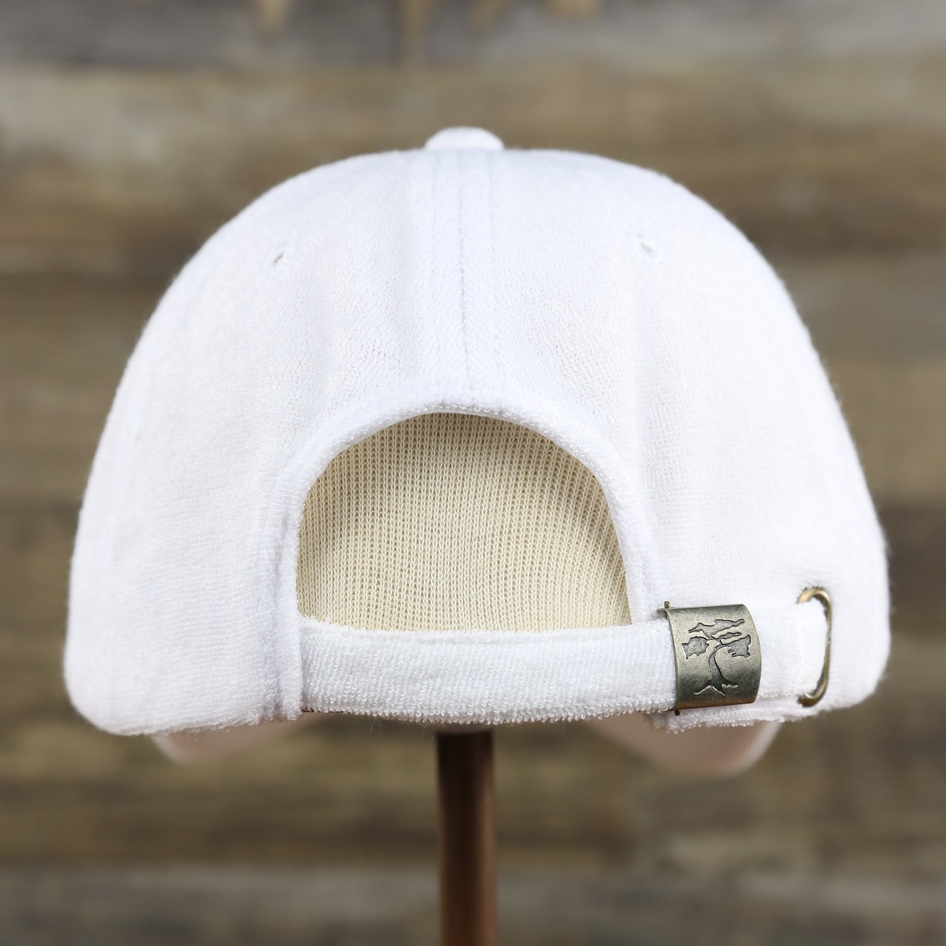 The backside of the Blank Snow White Wash Cloth Baseball Hat | White Dad Hat